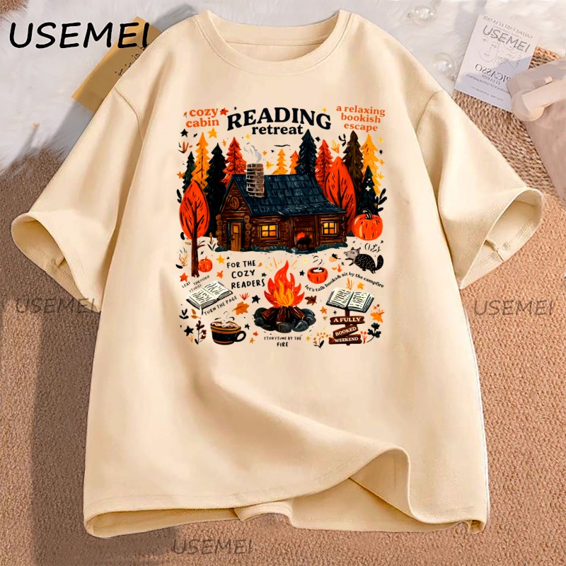 เสื้อยืดลาย Cozy Cabin Reading - Herbal Wellness Book บทวิจารณ์และราคา